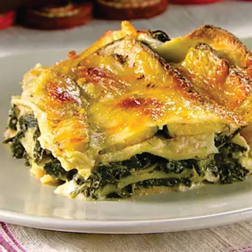 prepared frozen spinach and feta lasagne, heat-n-eat ready meal that can be prepared in the microwave, airfryer or oven. layers of tender pasta with a generous helping of vibrant spinach, bechamel sauce, and tangy feta cheese, creating a savory symphony that will transport your taste buds to the sun-drenched coasts of Greece.