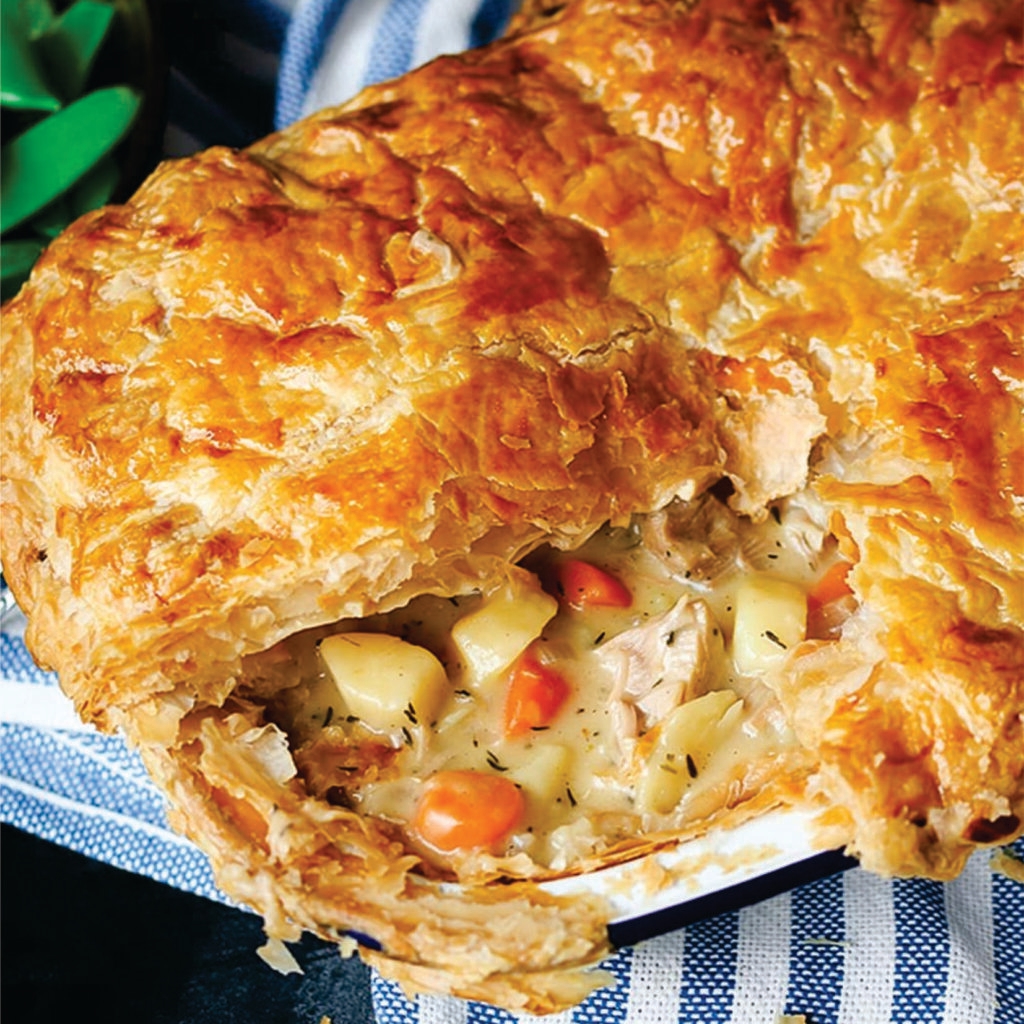 prepared frozen chicken pie, heat-n-eat ready meal that can be prepared in the microwave, airfryer or oven. Each pie is generously filled with succulent, tender chicken and a medley of garden-fresh vegetables, all enveloped in a rich, creamy sauce and encased in golden, flaky pastry.